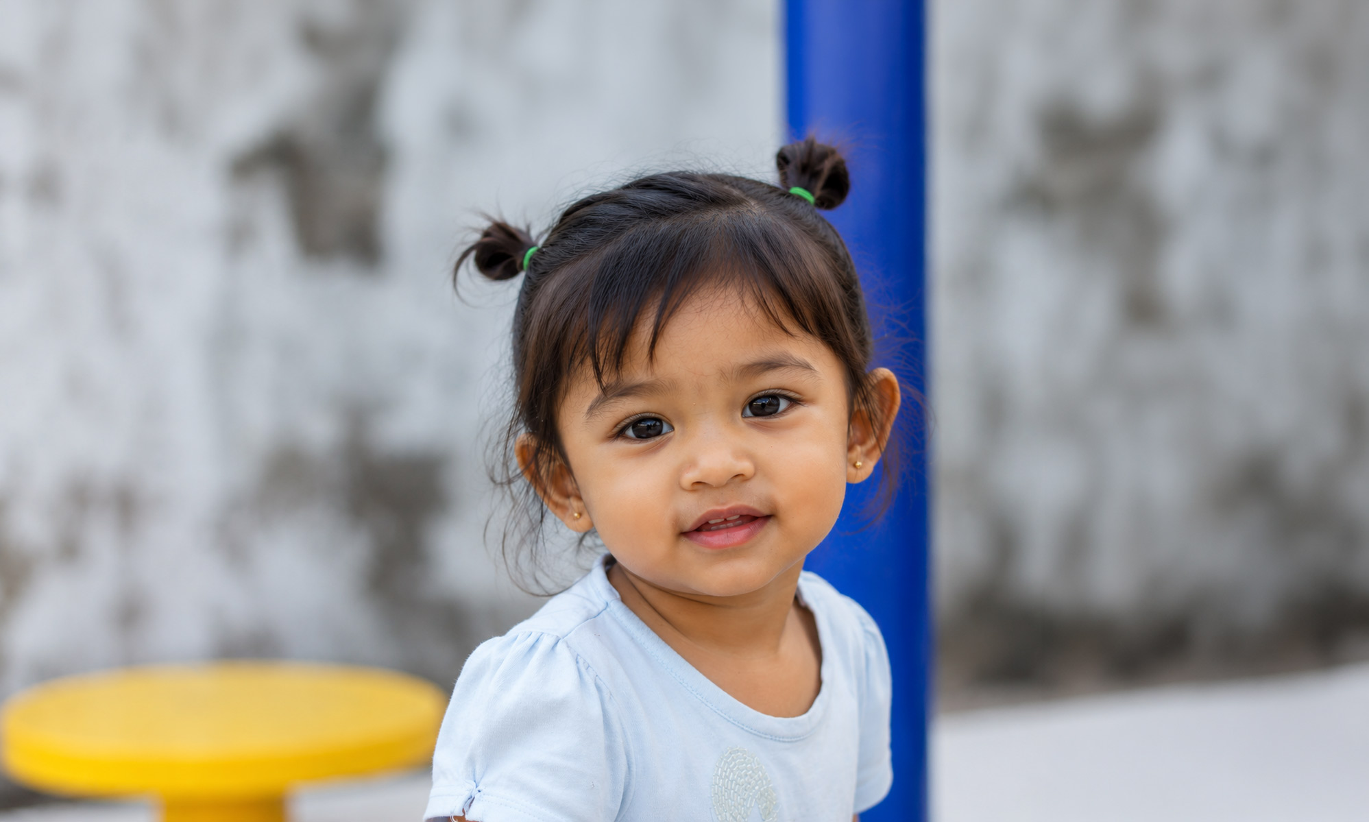 Child smiling during a therapy session